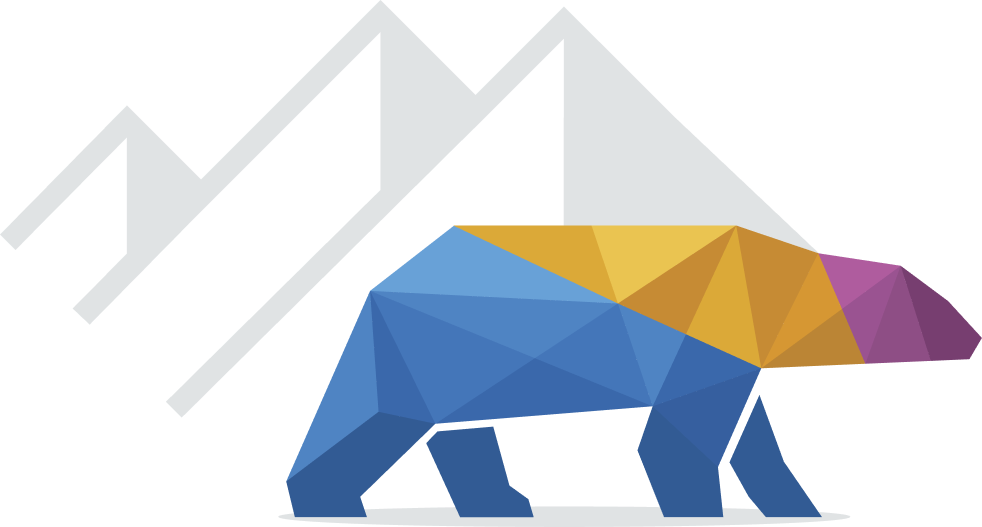 Geometric bear in front of mountains